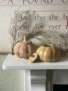 Pair of carved soapstone pumpkins circa 1960